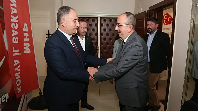 KAVUŞ'TAN MHP İL BAŞKANI KARAARSLAN'A HAYIRLI OLSUN ZİYARETİ
