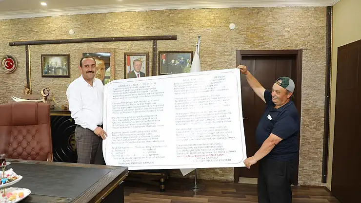 Başkan İlmek'e şiir hediyesi